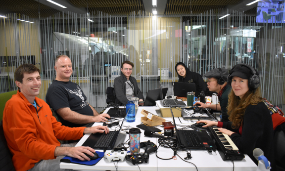 Six game jammers smile at the camera