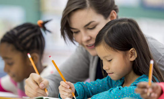 Kids and a teacher doing activities