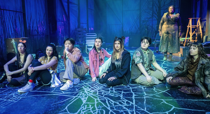 A group of people sitting on the floor
