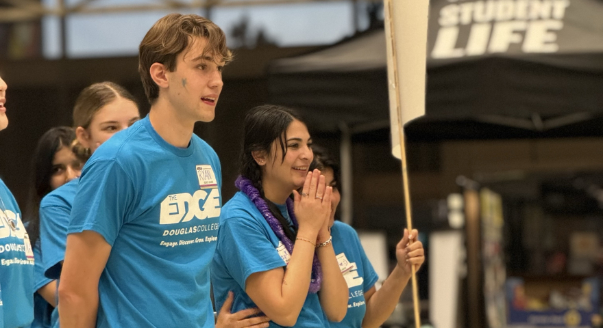 Students using blue t-shirt with a surprise expression on their faces