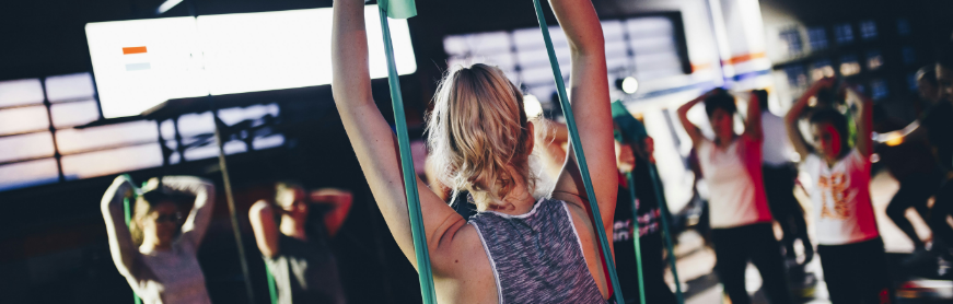 A group of people working out with resistance bands