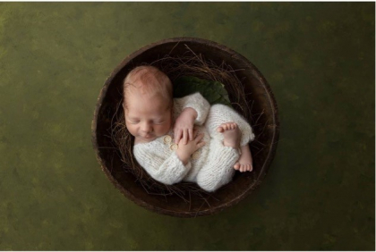 Baby Sleeping in Basket