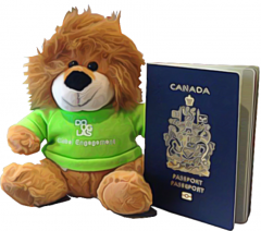 Roary the lion with Global Engagement t-shirt and a passport