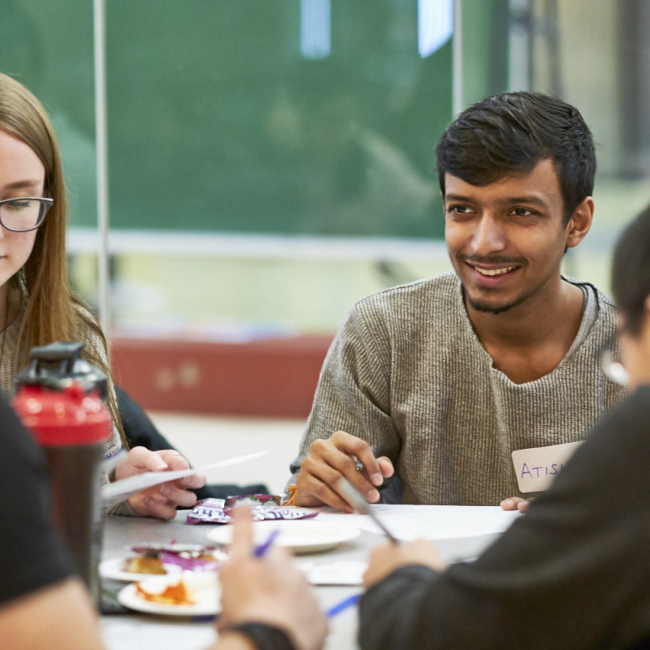 Four students working on a project