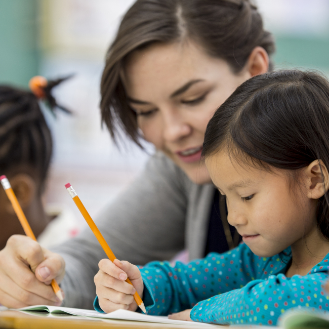 Kids and a teacher doing activities
