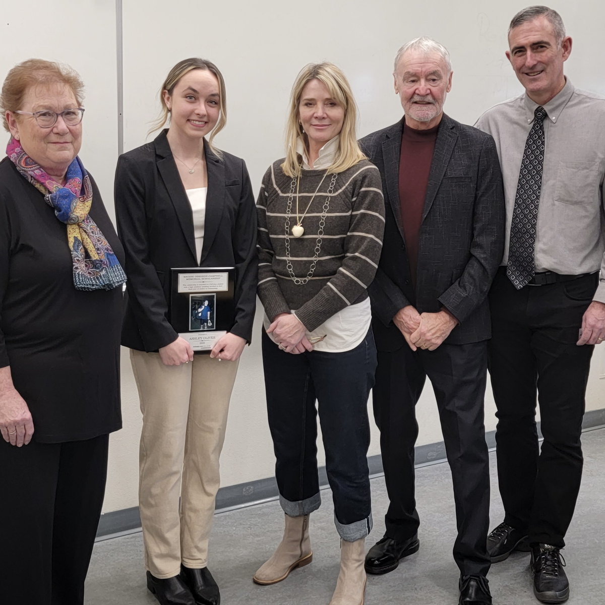 Brodie-Osbourne family with award recipient